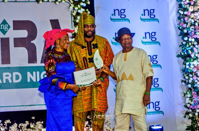 Mr Muhammed Rudman (l) NiRA’s President and Mrs Mary Uduma (r), a former President of NiRA, presenting the President’s Special recognition award to Rave TV received by Louisa Olaniyi.