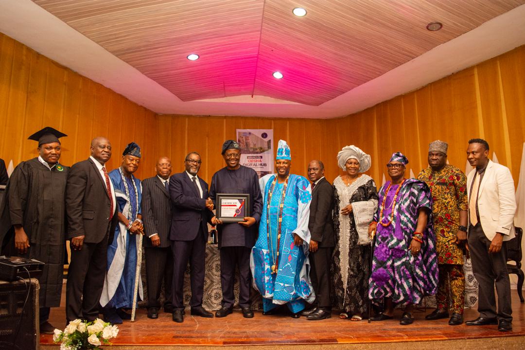 L-R: Dr. Cornelius Adewale; Dr. Wale Alonge; Elegboro of ijebu-jesa Oba Moses Oluwafemi Agunsoye; Prof David Olowokere; Prince Abimbola Olashore presenting a special award to Sir Demola Aladekomo(the keynote speaker); Asiwaju Olayinka Fasuyi; Lateef Bakare; Chief (Mrs) Dupe Ajayi-Gbadebo; Owaloko of Iloko Ijesa Oba Olusayo Ogungbangbe, Honorable Shola Ogungbile, the Osun State Commissioner for Finance, and Dr. Babatunde Ojo, at Ijesha Digital Hub graduation ceremony held on July 8, 2024.