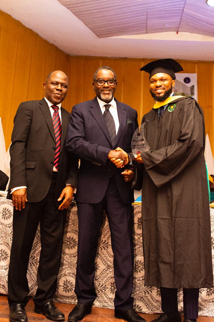 L-r: Lateef Bakare, Prince Abimbola Olashore presenting special award to Mr: Femi Bakare, Domain leader and mentor for UI/UX Design