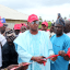 Chief S.B Olukolu, Patron of Oriba Youth Movement commissioning flaked around by his aids and staff of LG Electronics, Mr. Paul Mba, Marketing Manager, LG Electronics, Nigeria at the official commissioning of the solar-powered borehole and streetlights donated to Oriba Community area of Epe Lagos State today.