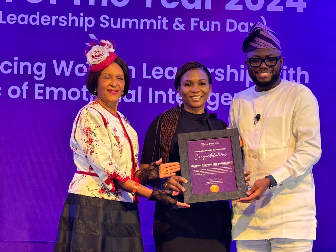 Mojisola Ologe (middle) receiving the The Peak Performer FEST 2024 Admirable Woman in Leadership Award.