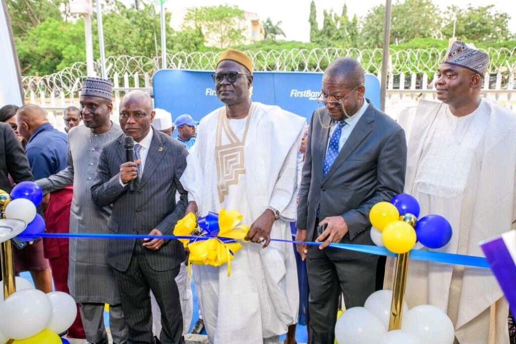 First Bank Strengthens Digital Transformation Drive with Launch of New Xperience Centre in Abuja 2 The Group Chief Executive Officer, First Bank of Nigeria Limited, Olusegun Alebiosu (second from left) and Senator Babangida Hussaini commissioning of FirstBank Digital Xperience Centre in Abuja on Wednesday, October 8, 2025.