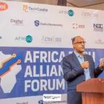 Muhammed Rudman of IXPN speaking at AfriTECH 5.0 and ATAEx Awards 2025