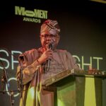 Director General of NITDA, Kashifu Inuwa CCIE, represented by Ayodeji Eniola, PhD, Director DG'S Office delivering the DG's speech at the event.